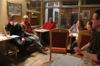 The final committee meeting before the festival, taking place in the conservatory at The Pendle Witch, Atherton